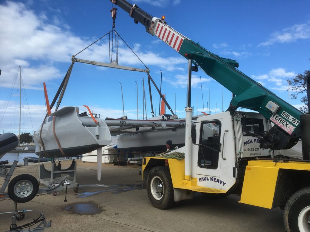 Lift Catamaran RPAYC Newport mobile franna crane lifted catamaran boat into water