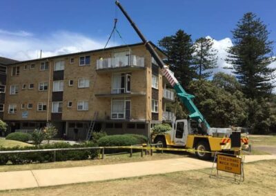 Crane lift 4 storeys building Sydney North