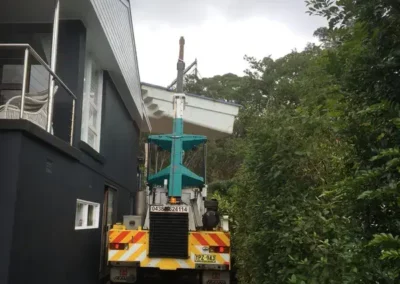 mobile franna crane fibreglass pool over house into backyard tight access